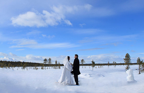 couple on frozen lake